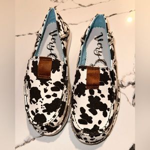 Cow print slip ons